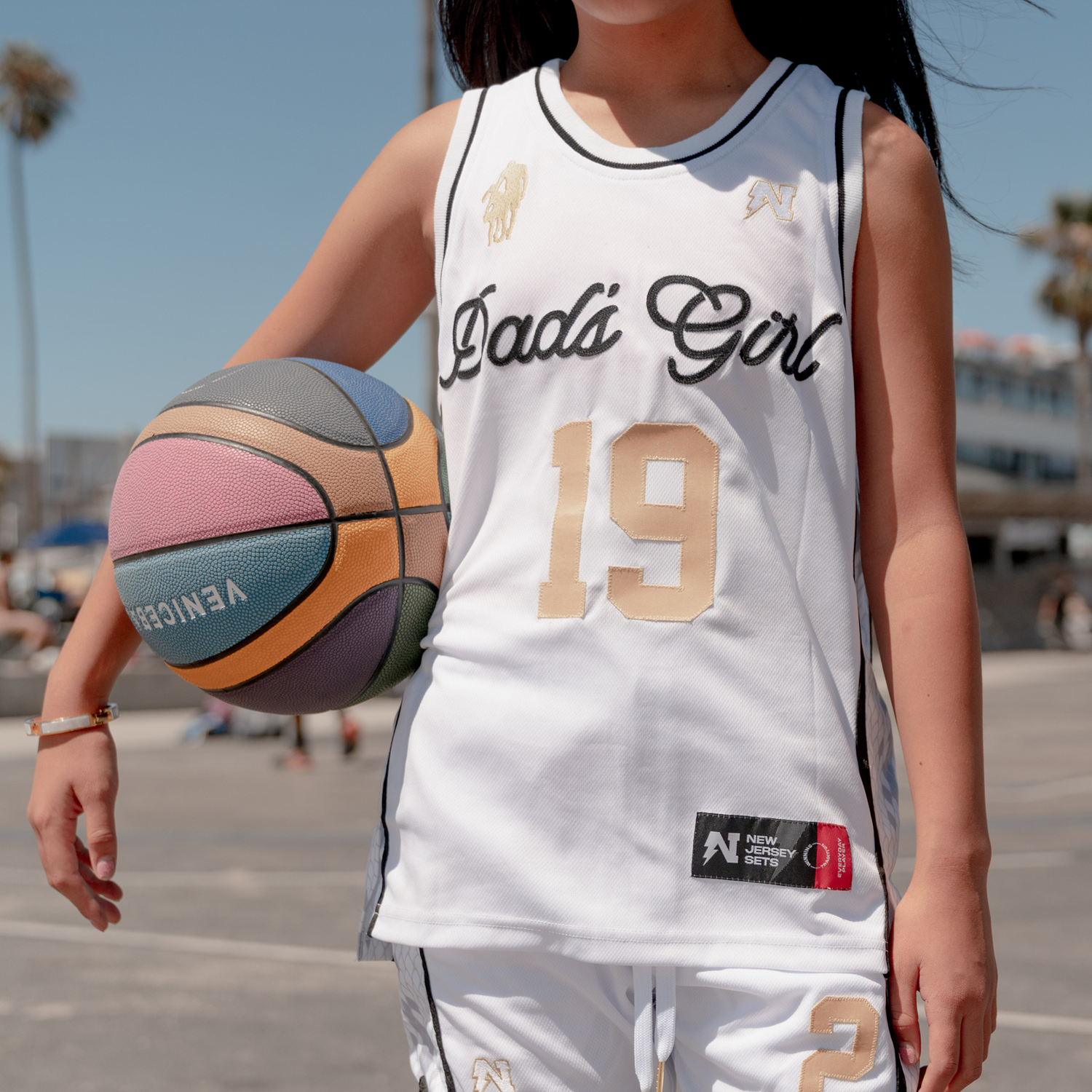 Girls in basketball jerseys sales